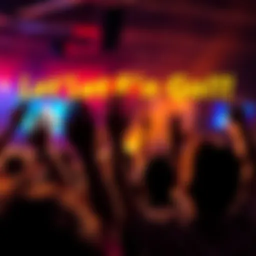 A group of people celebrating with raised hands at a lively event, showing enthusiasm and energy