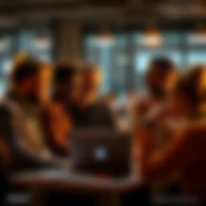 A group of forum moderators engaged in a discussion about community management, looking at a laptop and sharing ideas.