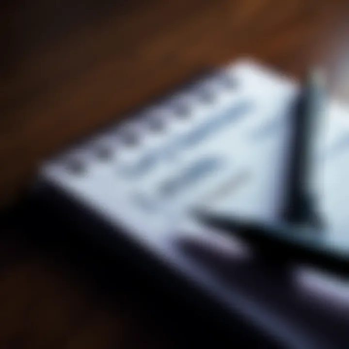 A close-up of handwritten survey questions on a notepad with a pen